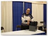 Workshop Director, David Pinto, ready to leave exhibitor's hall at CTA Conference close.